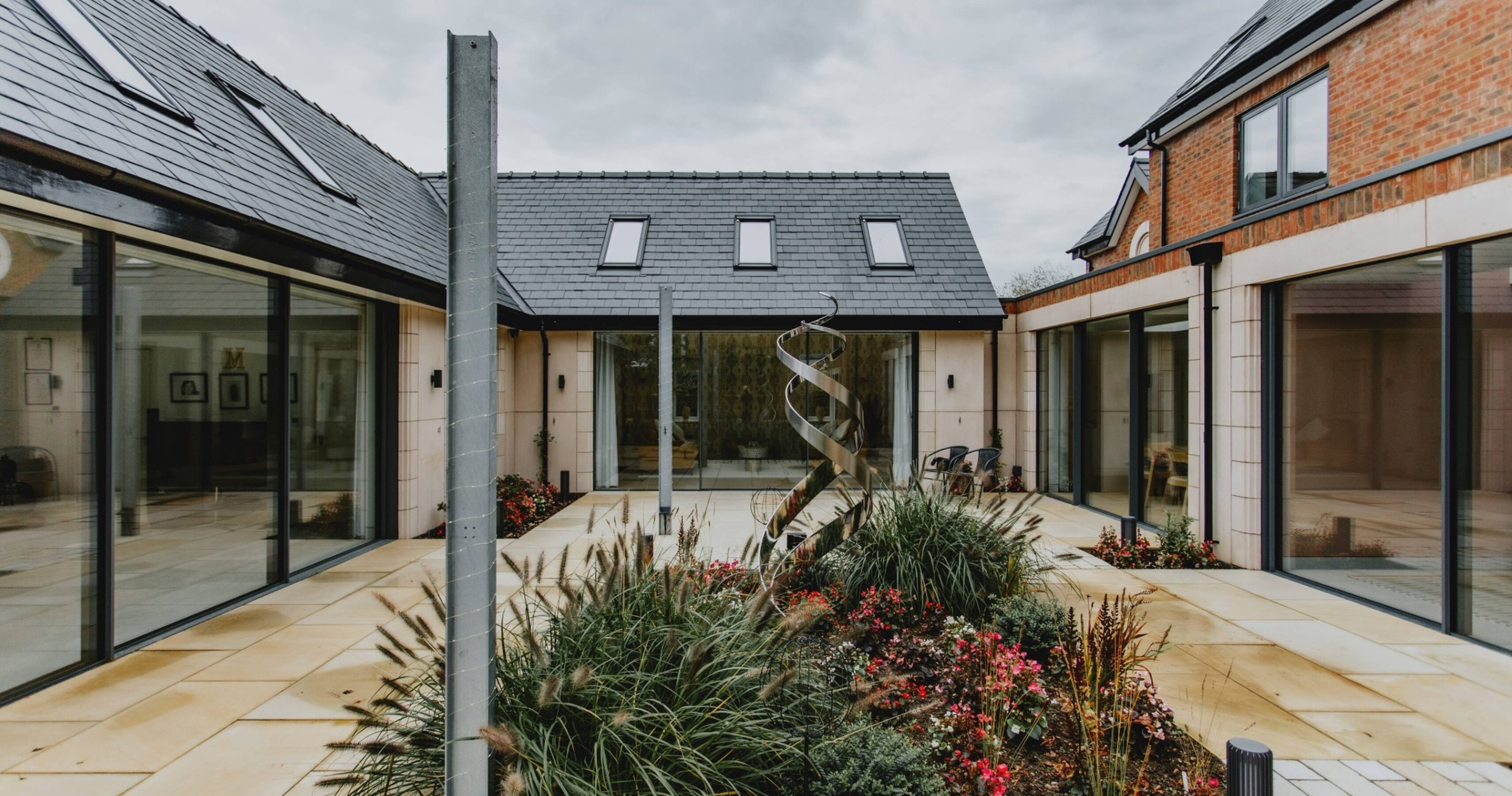 Courtyard View of Slim Sliding Glass Doors in Nottingham